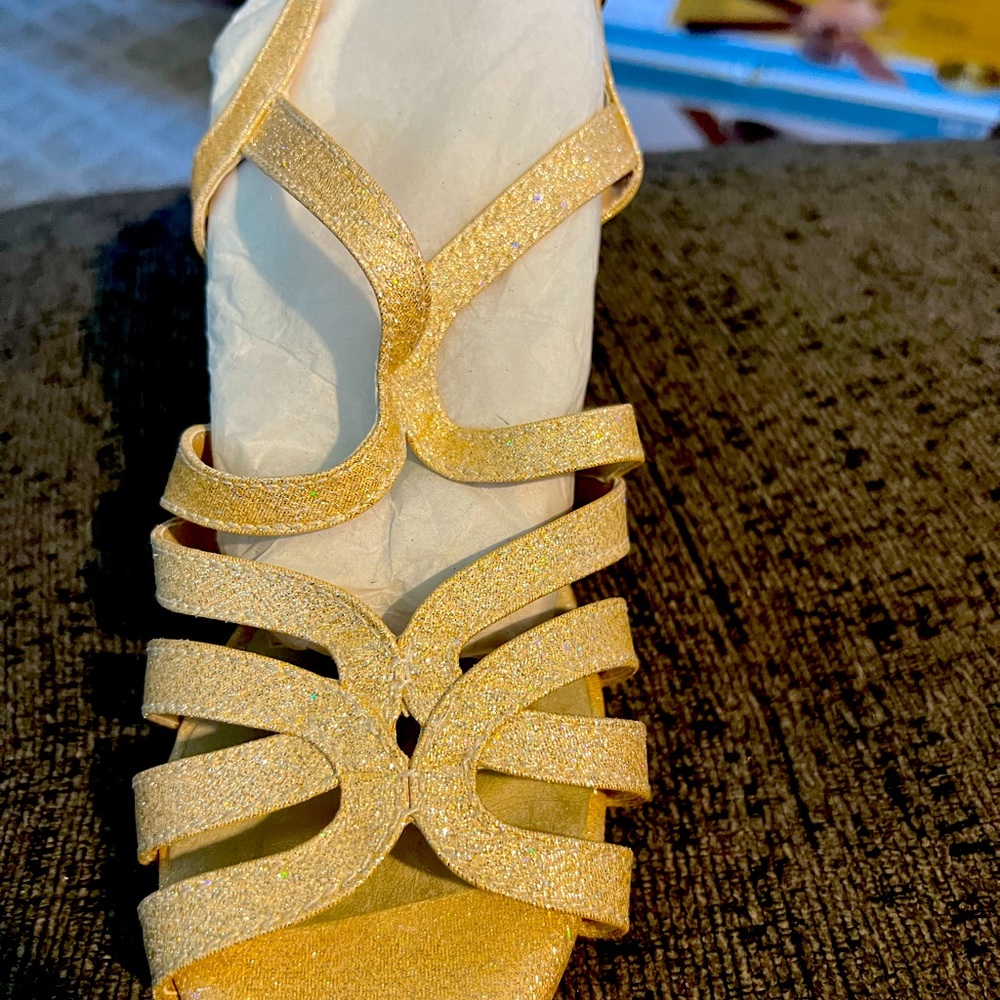 New beautiful Champagne color heels. Size 8D. Box is damaged